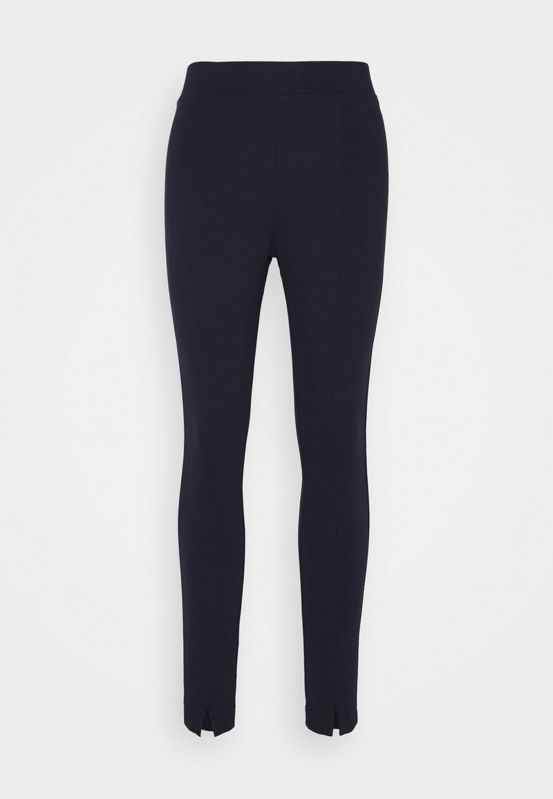 Marina blå leggings med en åtsittande design, med sidosprund vid fållen och ett mjukt, elastiskt tyg för komfort.