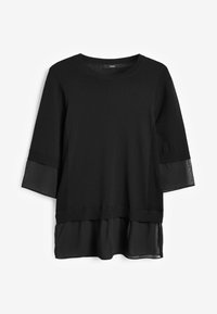 Blusa nera in maglia con maniche 3/4, caratterizzata da polsini e orlo in tessuto trasparente, scollatura rotonda e vestibilità comoda.