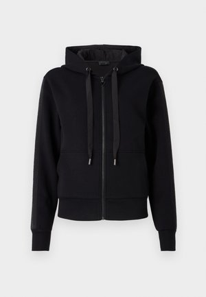 Black zip-up hoodie made of soft fabric, featuring a hood, drawstrings, and ribbed cuffs. Smooth texture with side panel accents.