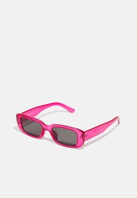 Pink transparent rectangular sunglasses with gray tinted lenses and sleek arms featuring minimal hardware details.