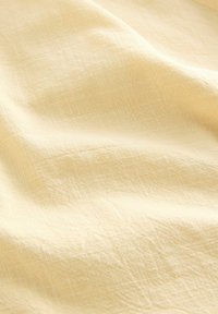 Next REGULAR FIT - PUFF SLEEVE MIDI - Denní šaty - buttermilk yellow