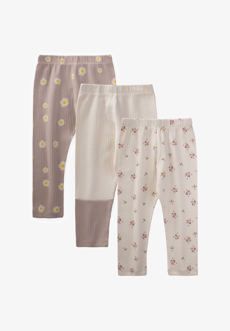 Tre par tjejs leggings: två med blommotiv i beige och vitt, en i ljuslila med prästkragar. Ribbad textur.