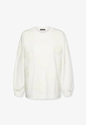 Felpa bianca a maniche lunghe con sottili motivi floreali ricamati in rilievo sul davanti e sulle maniche, con scollo rotondo.