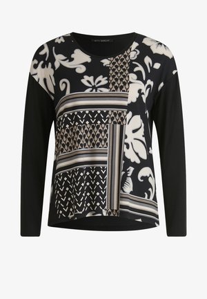 Czarna bluzka z długim rękawem, zdobiona mieszanką wzorów roślinnych i geometrycznych w kolorze kremowym i taupe z przodu, z gładkim czarnym tyłem.