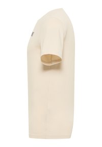Light beige short-sleeve t-shirt featuring a crew neck and a straight cut. Smooth cotton fabric with no visible patterns or accents.