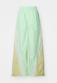 PANT - Træningsbukser - glow green/halo gold