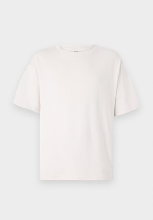 Witte korte mouwen t-shirt van zacht katoen. Heeft een ronde hals en een relaxte pasvorm. Glad materiaal zonder patronen of accenten.