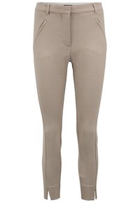 Beżowe spodnie slim fit w małe ciemne kropki, z bocznymi kieszeniami i rozporkami u mankietów. Gładka struktura materiału i dopasowany krój.