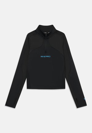 Svart langermet Nike Pro topp med kvart-zip krage, blå logo på brystet og teksturert stoff. Har tettsittende design og sidespalter.