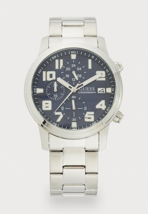 Orologio cronografo in acciaio inox argentato con quadrante blu scuro, grandi numeri bianchi, tre sottoquadranti e visualizzazione della data alle 4.