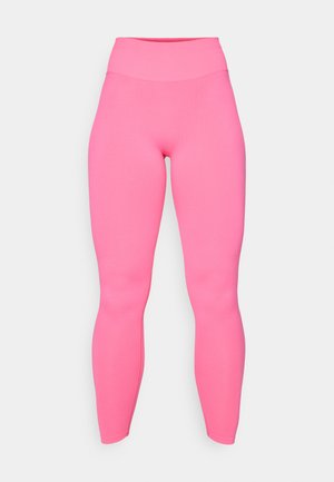 Roze tajice visokog struka izrađene od rastezljivog materijala. Glatka tekstura, prilagodljiv dizajn, do gležnjeva, bez vidljivih uzoraka ili metalnih dijelova.
