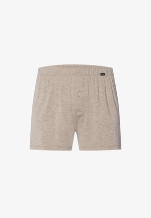 Jasnobeżowe bokserki męskie z elastycznym pasem i rozporkiem na pojedynczy guzik, wykonane z miękkiej bawełnianej tkaniny.