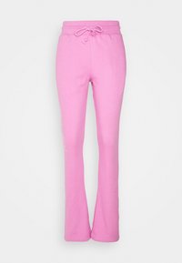 Roze trainingsbroek met een drawstring tailleband, flared pijpen en subtiele logodetails aan de zijkant. Gemaakt van een zachte katoenmix.