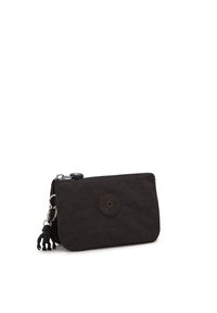 Portefeuille en tissu noir avec une finition texturée, doté d'une fermeture zippée, d'un détail logo circulaire et d'un charm en forme de singe noir amusant attaché.