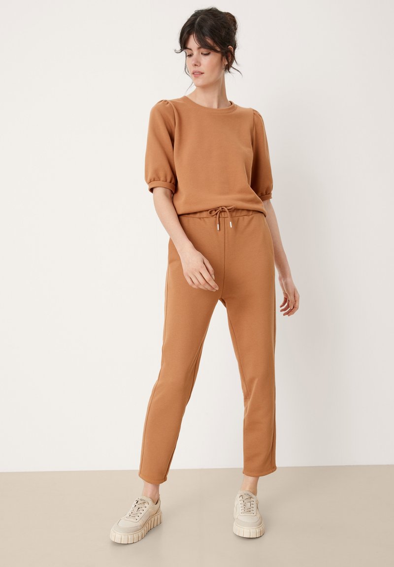 s.Oliver Pantalon de survêtement - sandstein