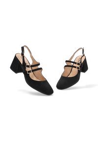 Zapatos negros tipo slingback con parte superior texturizada, punta afilada y dos correas ajustables en el tobillo. Tacón grueso para estabilidad y comodidad.