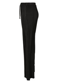 Pantalon large plissé noir avec taille élastique et cordon de serrage, présenté de profil sur un fond blanc.