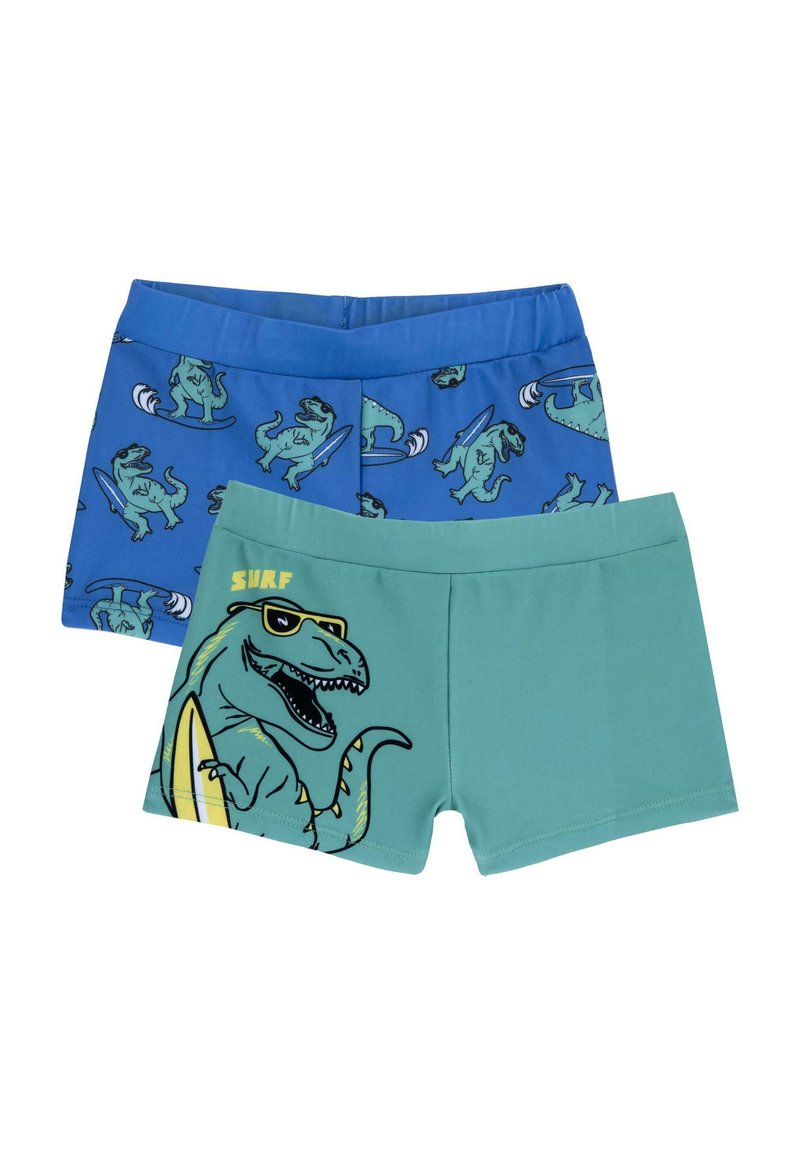Twee paar jongens zwembroeken: één blauwe met dinosaurussen surfpatronen, één groene met een grote dinosaurus grafiek en de tekst "SURF".