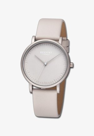 Montre ronde avec un cadran gris clair, des marqueurs d'heure minimalistes et des aiguilles argentées. Elle dispose d'un bracelet en cuir beige doux avec une texture lisse.