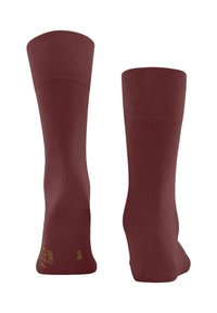Burgunderfarbene Socken mit gerippter Textur, mittellang, mit gedruckten gelben Größenangaben auf der Sohle. Weicher, dehnbarer Stoff für Komfort.