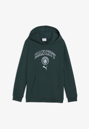 Sweat à capuche vert foncé avec poche avant, inscription "Man City", emblème de Manchester City et logo Puma blanc sur la poitrine.