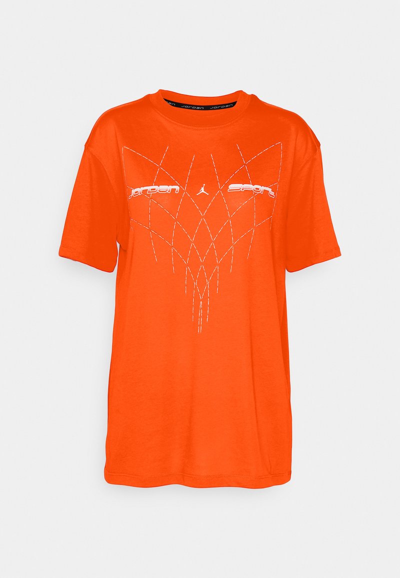 T-shirt orange à manches courtes en coton, avec un texte imprimé blanc "Jordan" et "Sport" accompagné de lignes entrecroisées formant un motif géométrique.