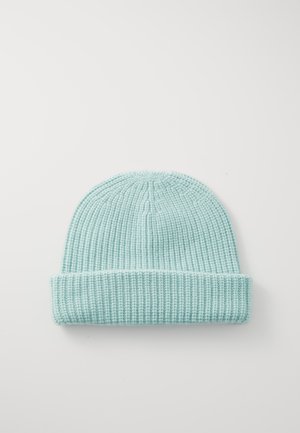 Light blue knitted beanie hat with a rolled brim, featuring a ribbed texture and a pom-pom detail on top.