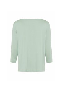 Lichtgroene, zachte stoffen top met een brede ronde hals. Heeft driekwartmouwen en een ontspannen pasvorm. Geen zichtbare patronen of accenten.