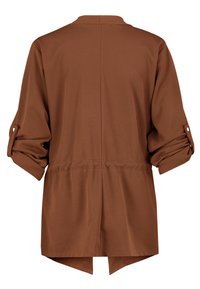 Bruine lange mouwen top met opgerolde mouwen en knoopdetails, met een getailleerde taille en een ronde zoom met een gespleten achterkant.