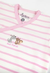 Striped short-sleeve toddler shirt in white and pink, featuring a rounded neckline and an illustration of a dog and a squirrel with the text “best friends.”