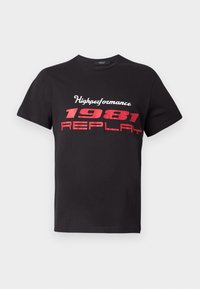 Black cotton t-shirt featuring a red graphic print that reads "Highperformance 1981 REPLAY." Short sleeves and crew neckline.