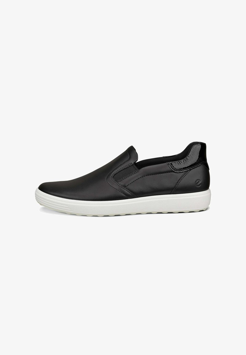 Scarpe slip-on nere in pelle liscia con pannelli elastici laterali, suola in gomma bianca e design minimalista.
