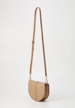 Small tan leather crossbody bag with a long adjustable strap and gold-tone clasps on a plain white background.