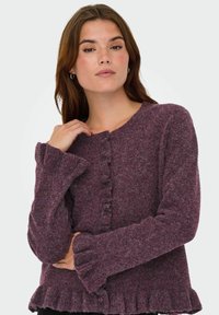 Cardigan violet en tissu texturé, avec un col rond, une fermeture à boutons et des poignets et un ourlet envolés.