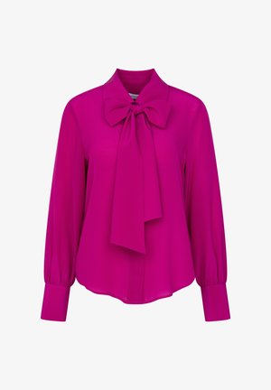 Blusa magenta a maniche lunghe con un grande fiocco al collo e polsini larghi, realizzata in tessuto leggero.