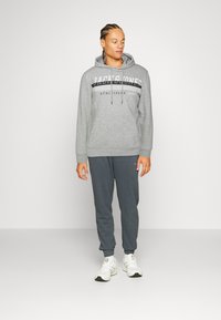 Jack & Jones JJIRON HOOD - Sudadera - light grey melange