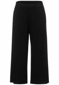 Svarta vida byxor i mjukt tyg, med hög elastisk midja och framfickor för extra detalj.