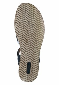 Sandale noire avec une semelle texturée présentant un motif en zigzag ; taille 37 marquée, logo discret sur la semelle.