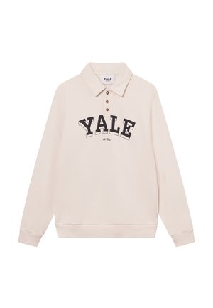Light beige long-sleeve polo with a collar, featuring a large black "YALE" print and three brown buttons. Soft cotton blend fabric.