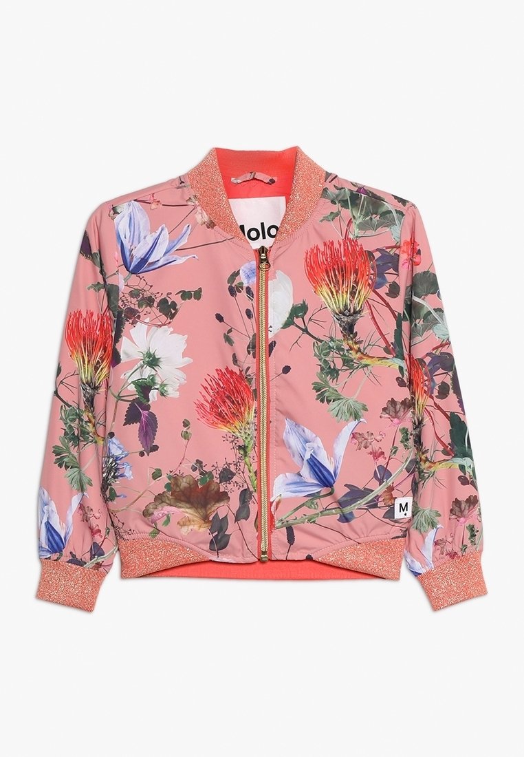 Veste bomber fleurie rose avec des fleurs rouges et bleues, des feuilles vertes, une fermeture éclair dorée et des poignets et col côtelés corail, étiquette taille medium visible.