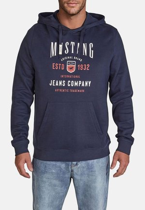 Navy blue hoodie made of cotton blend fabric. Features a kangaroo pocket, drawstring hood, and front graphic text in white and red.