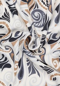 Textile featuring a white background with swirling patterns in navy, grey, and brown. Smooth texture, flowing design, and intricate detailing.