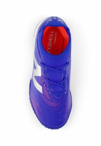 Vibrant blue athletic shoe with a textured surface, white accents, purple laces, and a red interior. Features a dotted pattern for style.