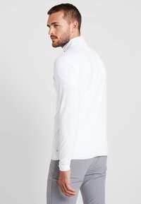 Calvin Klein Golf NEWPORT HALF ZIP - Tops ar garām piedurknēm - white