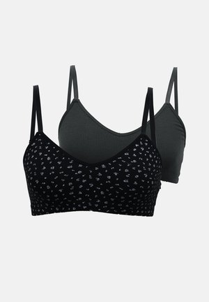 Black and gray bra set featuring a floral print on the black piece and a ribbed texture on the gray. Both have adjustable straps.
