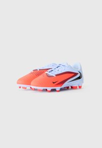 Football boots with a low-cut design, vibrant orange and light blue colors, textured upper, and multiple studs on the outsole for traction.