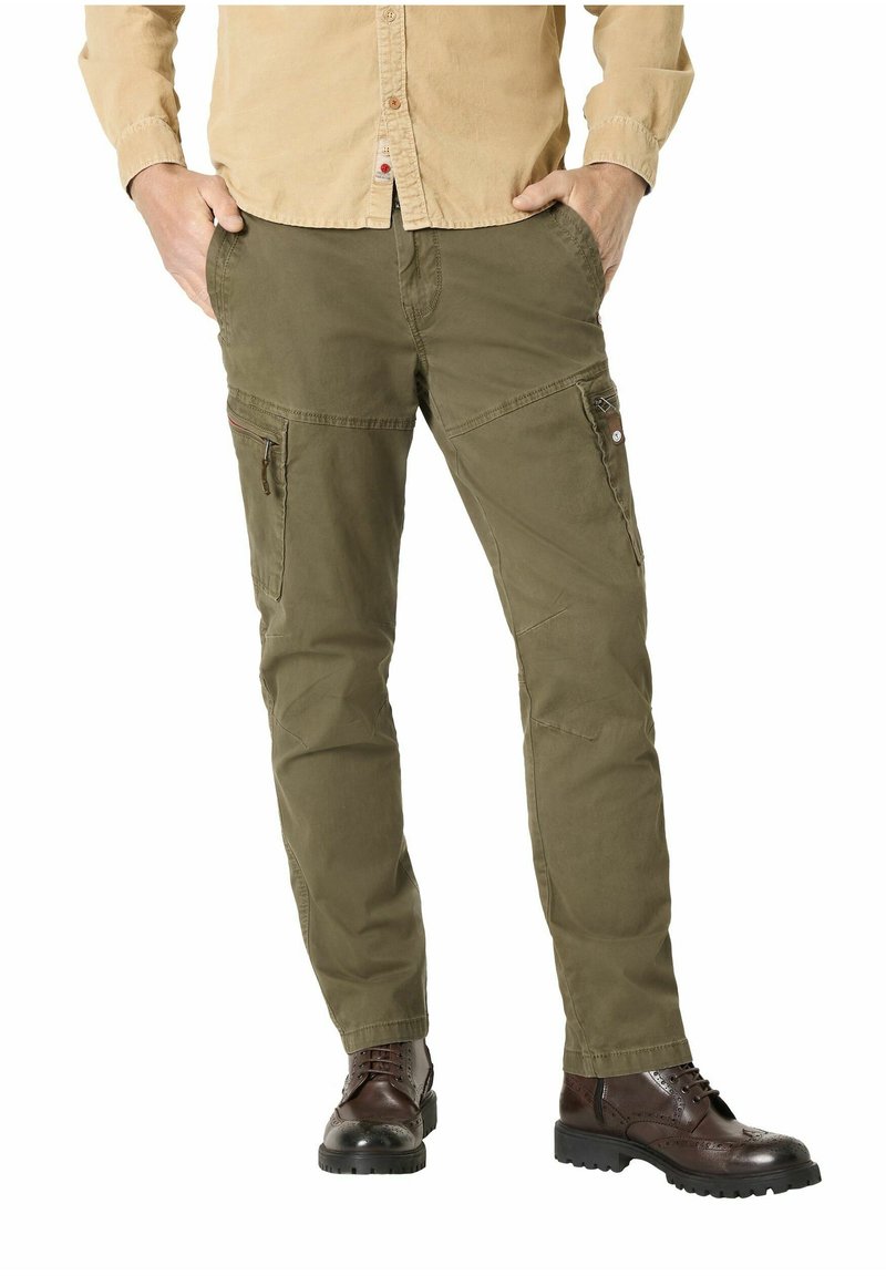 Olive green cargo pants with multiple pockets, zipper details, and a relaxed fit. Made from sturdy fabric, suitable for outdoor use.