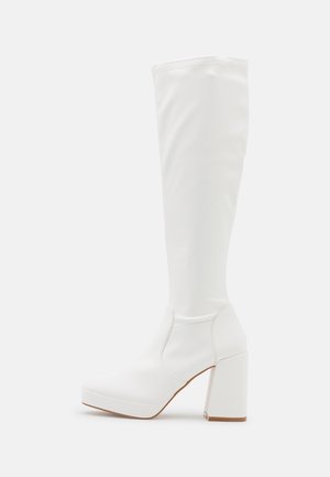 High heeled boots - white