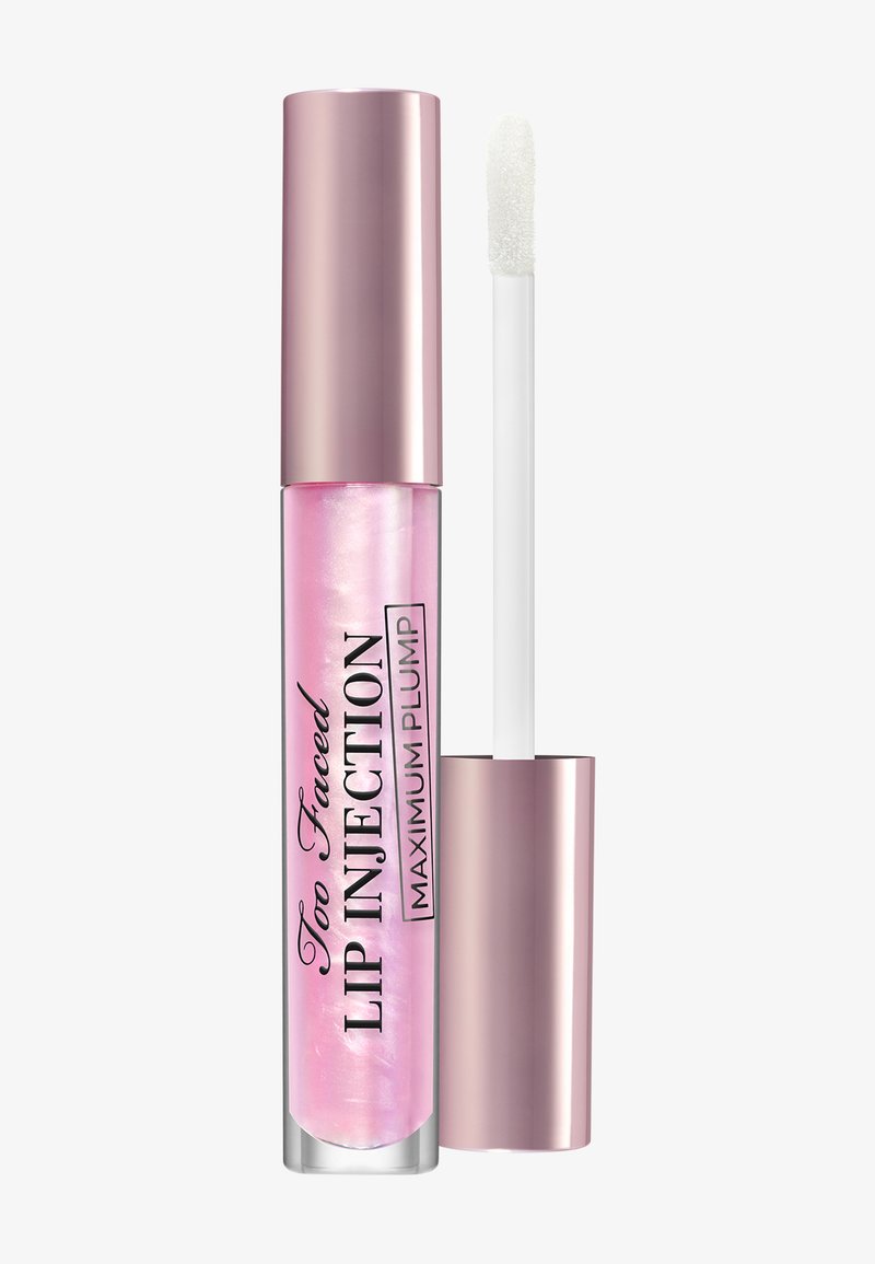 Translucent pink lip plumper in a clear tube, featuring a metallic pink cap. Includes a white applicator wand. Text: "Too Faced Lip Injection."