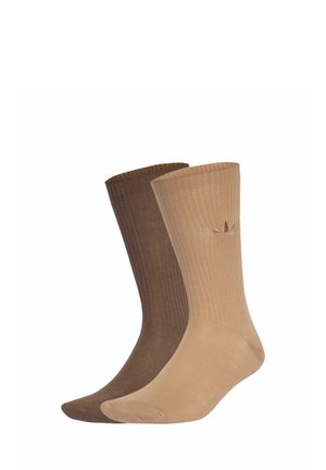 Tan and brown ribbed socks with a textured finish. Feature logo embroidery on the lighter sock, medium height, and smooth toe seams.